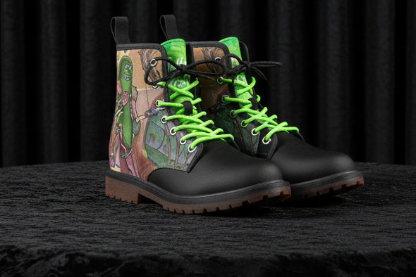 Black boots with green soles on a colorful background with cartoon characters.