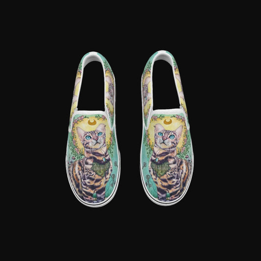 Slip-on shoes with cat illustrations on a white background