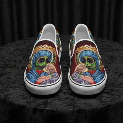 Colorful slip-on shoes with artistic design on a white background