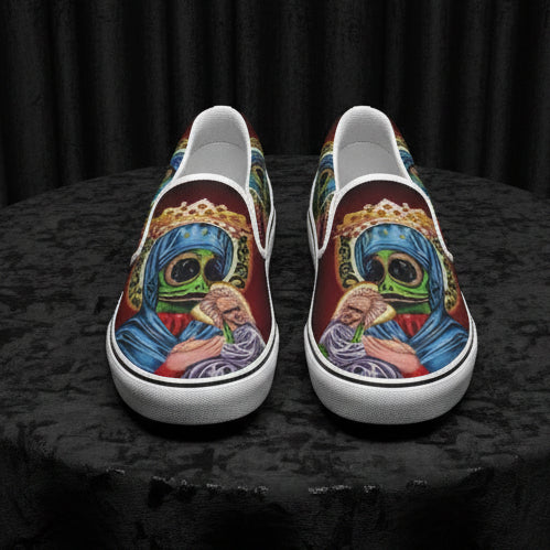 Colorful slip-on shoes with artistic design on a white background