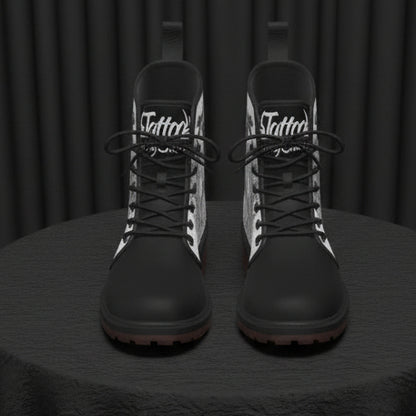 Black and white boots with 'Tattoo' branding on a white background