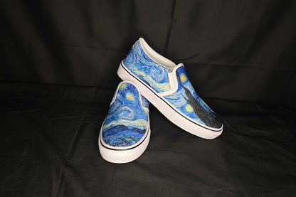 Pair of slip-on shoes with Starry Night design on a black background