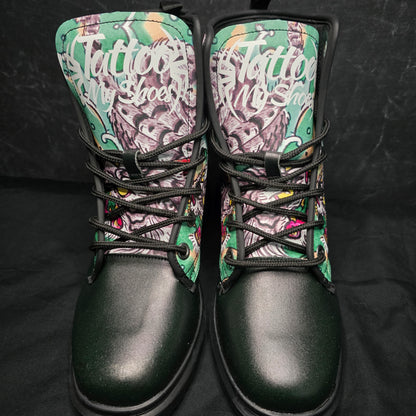 Pair of sneakers with colorful pattern on the side and black soles on a dark background