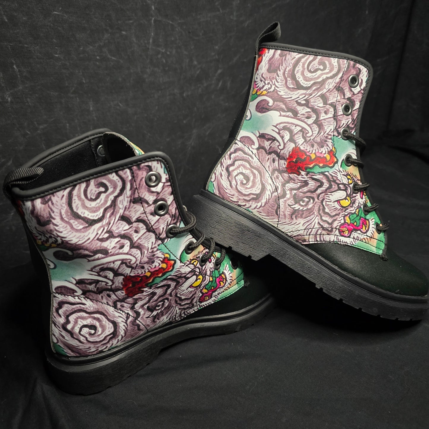 Colorful patterned boots on a dark textured background