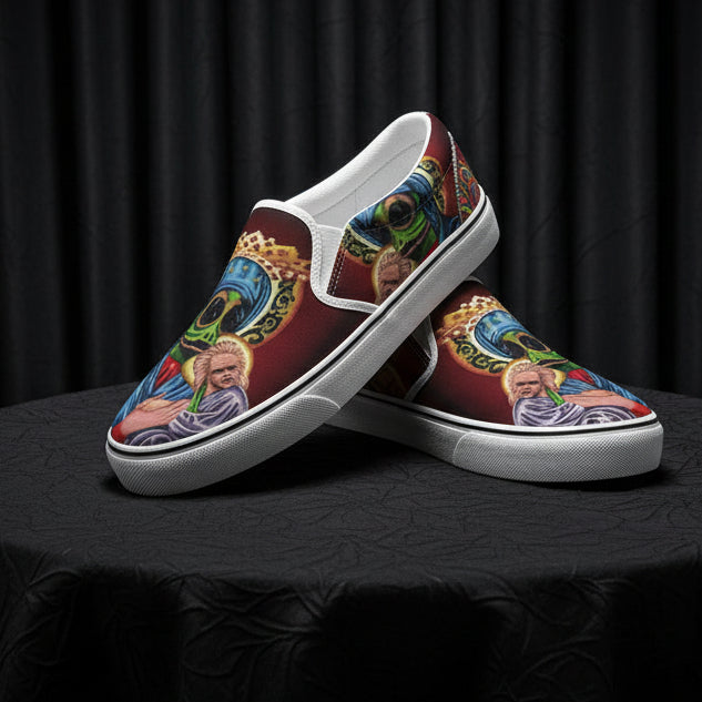 Colorful slip-on shoes with artistic designs on a white background