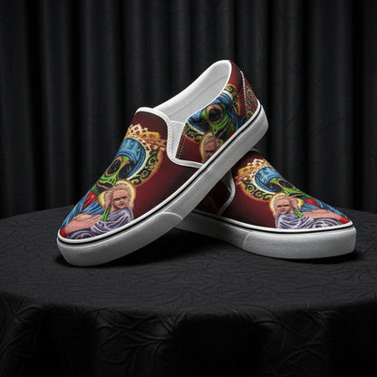 Colorful slip-on shoes with artistic designs on a white background