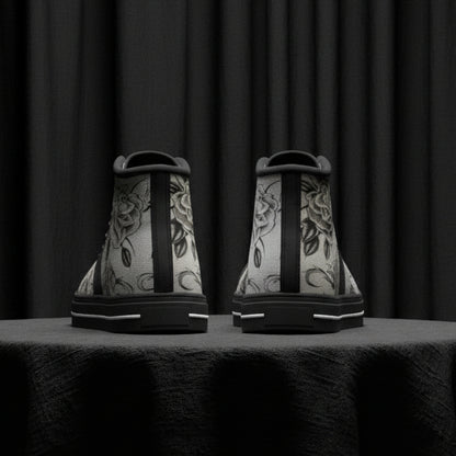 Pair of high-top sneakers with floral designs on a white background