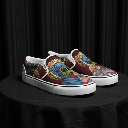 Colorful slip-on shoes with artistic designs on a white background