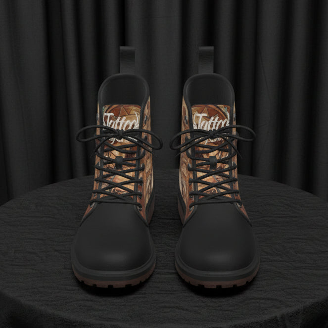 Pair of black and brown patterned boots on a white background