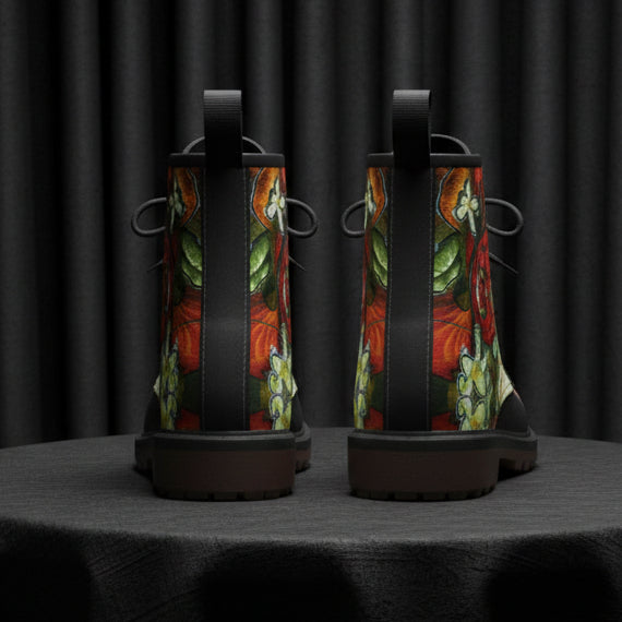 Pair of boots with floral design on a white background