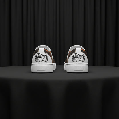 White sneakers with 'Tattoo My Shoes' design on a white background