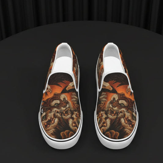 Pair of slip-on shoes with a tiger design on a black background