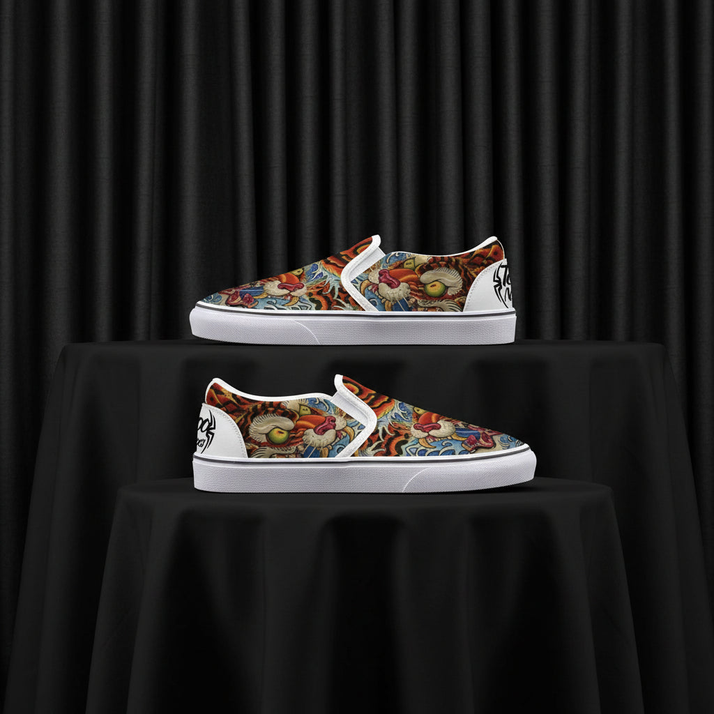 Pair of slip-on shoes with colorful Tiger pattern on a white background