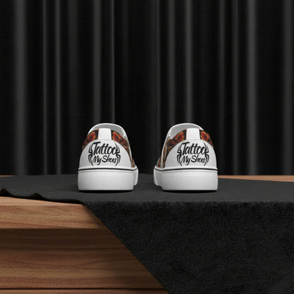 White sneakers with 'Tattoo My Shoes' design on a white background
