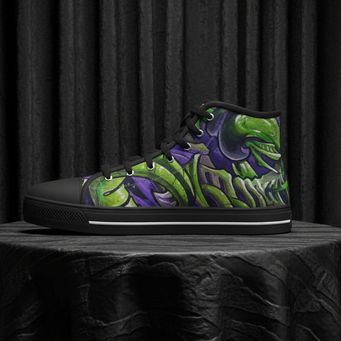 Black high-top sneaker with green and purple abstract design on a white background