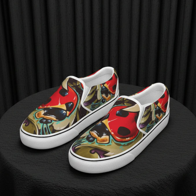 Colorful slip-on shoes with a abstract design on a white background
