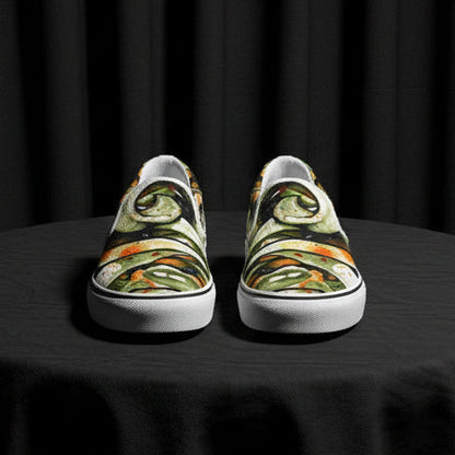 Pair of slip-on shoes with a colorful abstract design on a white background