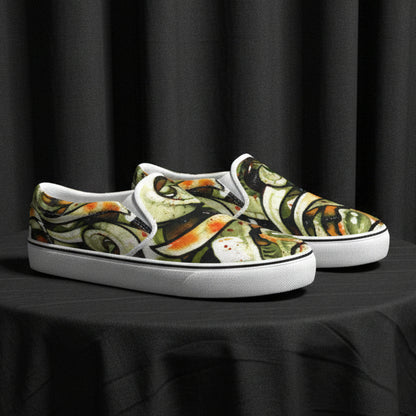 Pair of slip-on shoes with a colorful snake design on a white background