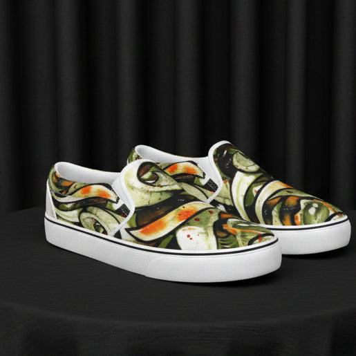 Pair of slip-on shoes with a colorful abstract design on a white background