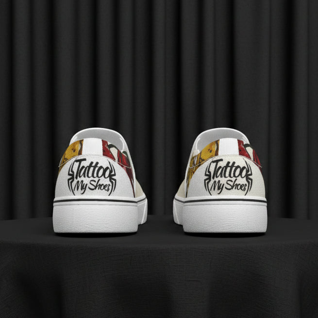 White sneakers with colorful designs and text on a white background
