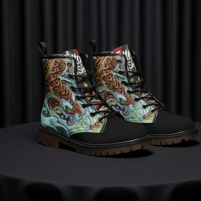 Colorful patterned boots with black soles on a white background